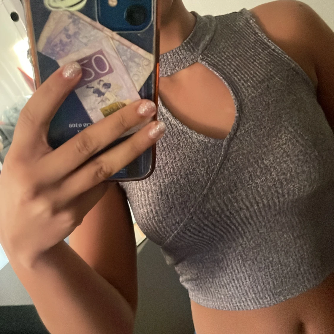 Grå ärmlös topp från Jennyfer