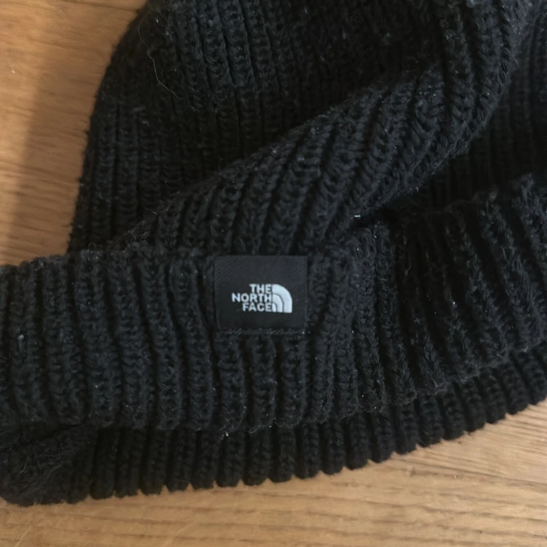 Svart stickad beanie från The North Face - 92