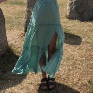 Långkjol  - Grön långkjol. Strl s. Fint skick 