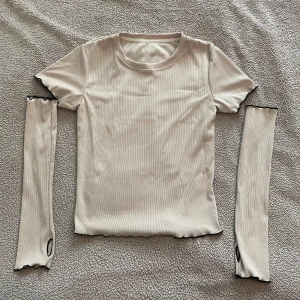 delad beige tshirt - är som ny, har aldrig använts