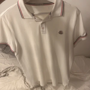 Moncler piké  - Äkta moncler skriv för frågor