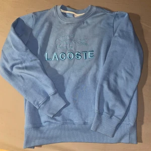 Lacoste Hoodie - Helt Nya Lacoste blå hoodie, Size S