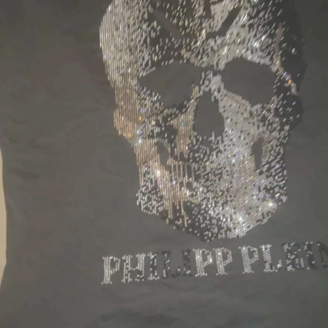 Svart t-shirt med dödskalle från Philipp Plein