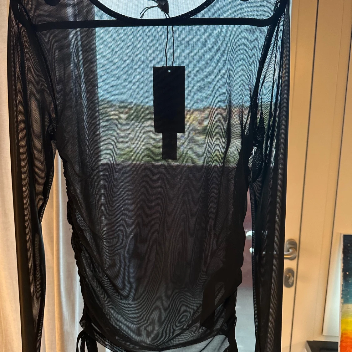 Svart Genomskinlig långärmad tröja