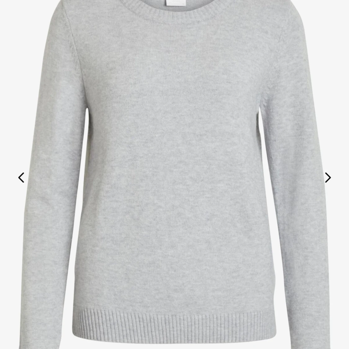 Grå stickad tröja