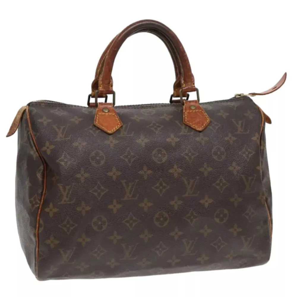 Louis Vuitton Speedy 30. Ett måste i väskkollektionen! Bra storlek för både vardagsbruk och resor. Perfekt att använda som skol-/arbetsväska. Speedy ger en touch av lyx och stil till varje outfit.. Väskor.