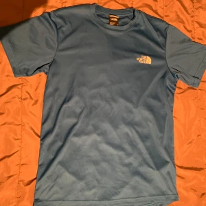 Blue North Face Sports T-shirt - Very good condition, fits like an M