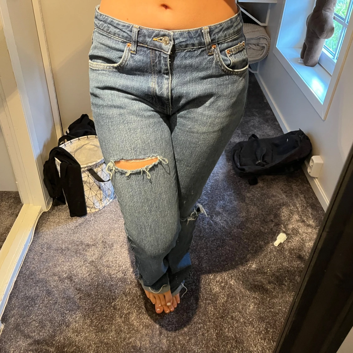 utsvängda jeans