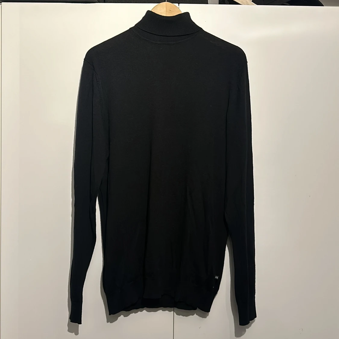 Svart polotröja från Matinique