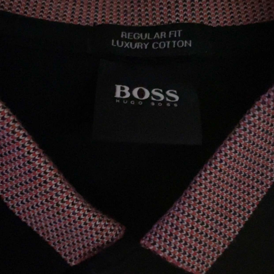 Svart pikétröja från Hugo Boss - 91