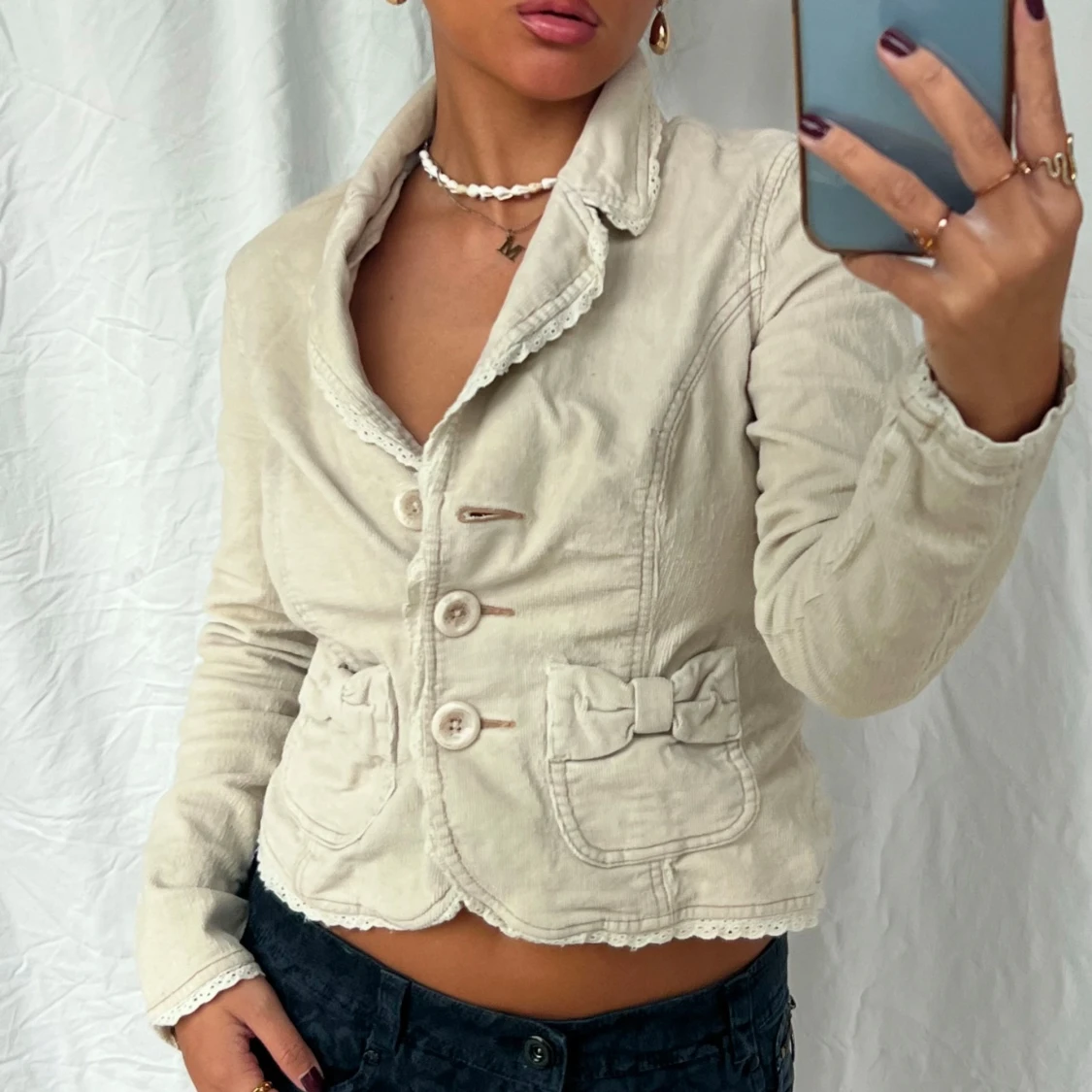 Beige jacka med knappar - 91