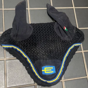 Equiline huva  - Equiline huva med E logga. Storlek full.