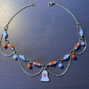 Handmade ghost and pumpkin necklace.🎀