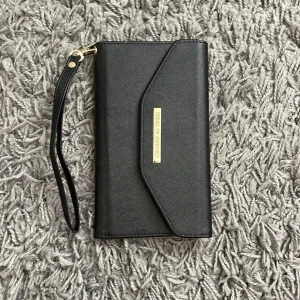 Mobilskal - Mobilskal/plånbok till en iPhone 7+ , inga effekter finns.