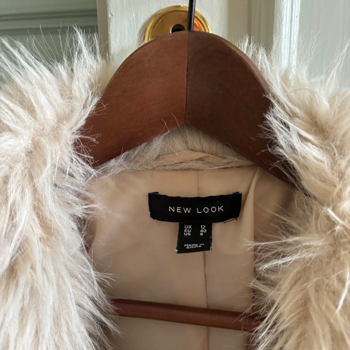 Beige pälsjacka New look  - 90