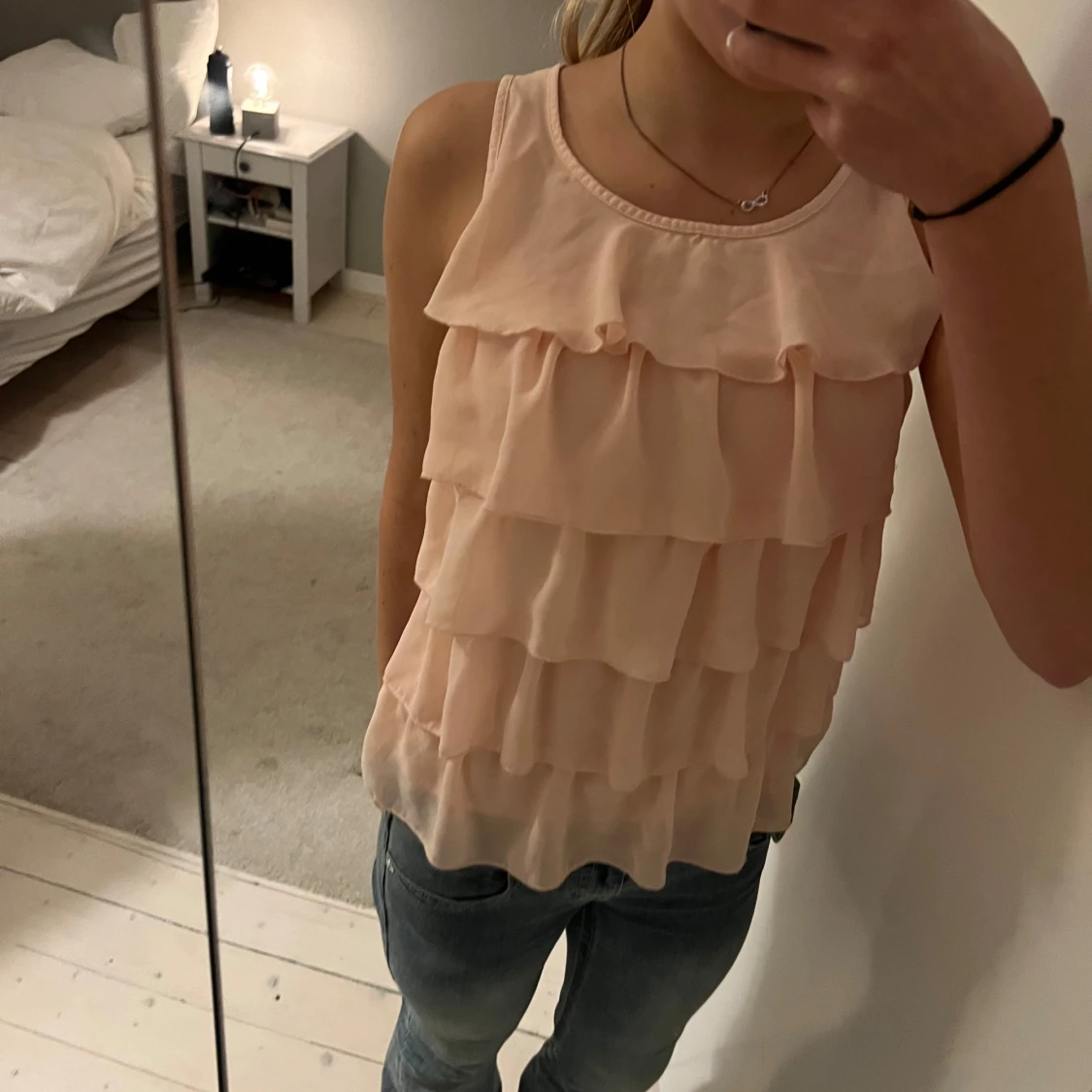 Ljusrosa volang blus