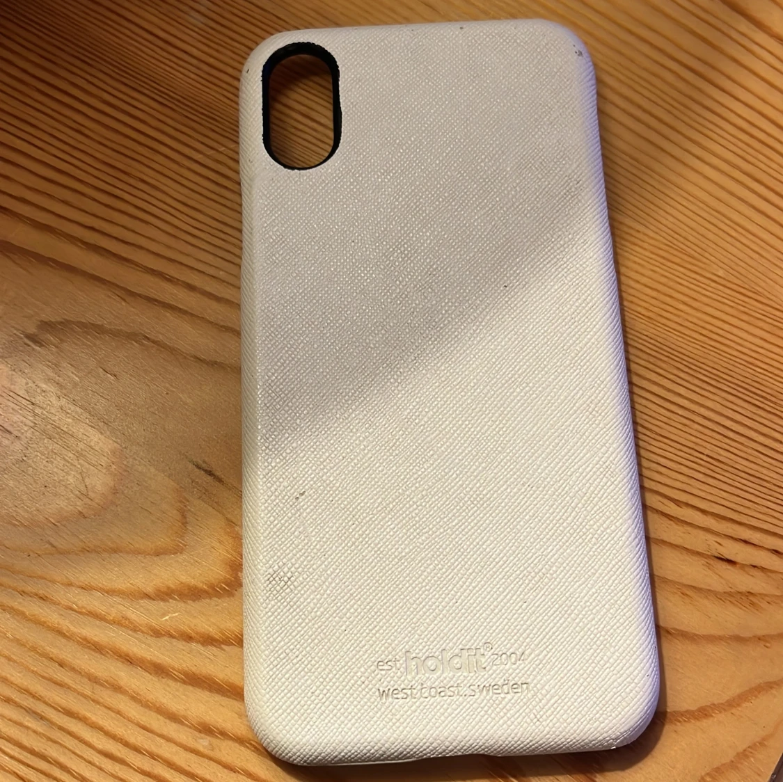 Vit mobilskal från Holdit