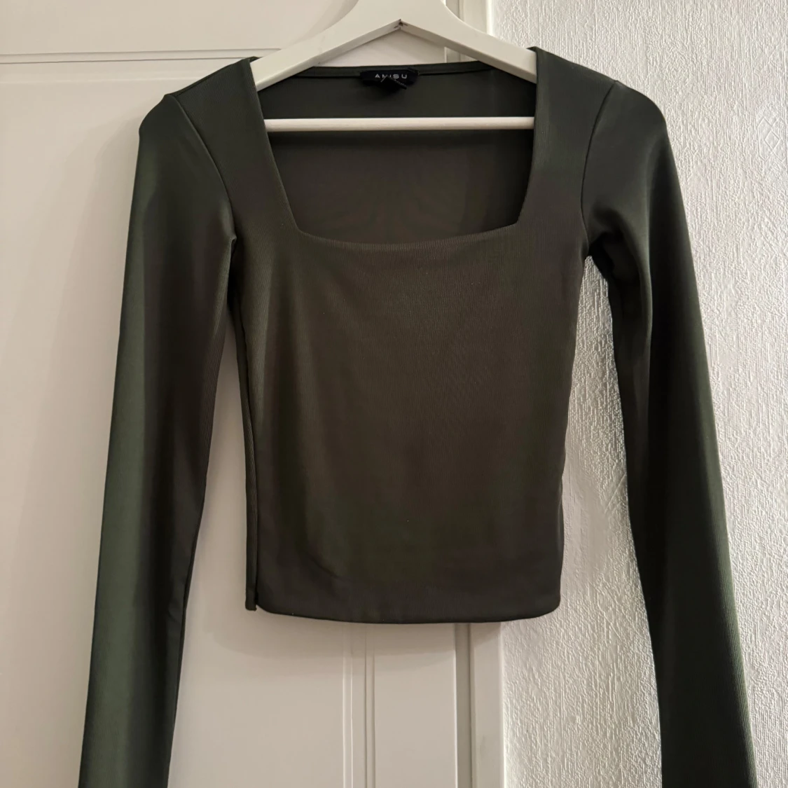 Grön långärmad topp från Amisu