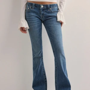 True Religion jeans  - Blå true religion bootcut low waist jeans. Köpta på Nelly i storlek W26. Aldrig använts. 