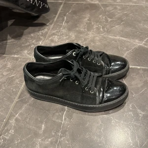 Svarta Lanvins - Ett par lanvins som är använda, skicket är 7/10.