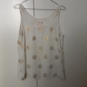Lindex Holly & White top - White top with golden dots. Size S. Shipping is not included.