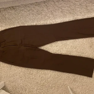 Bruna kostymbyxor - Använda enstak gång