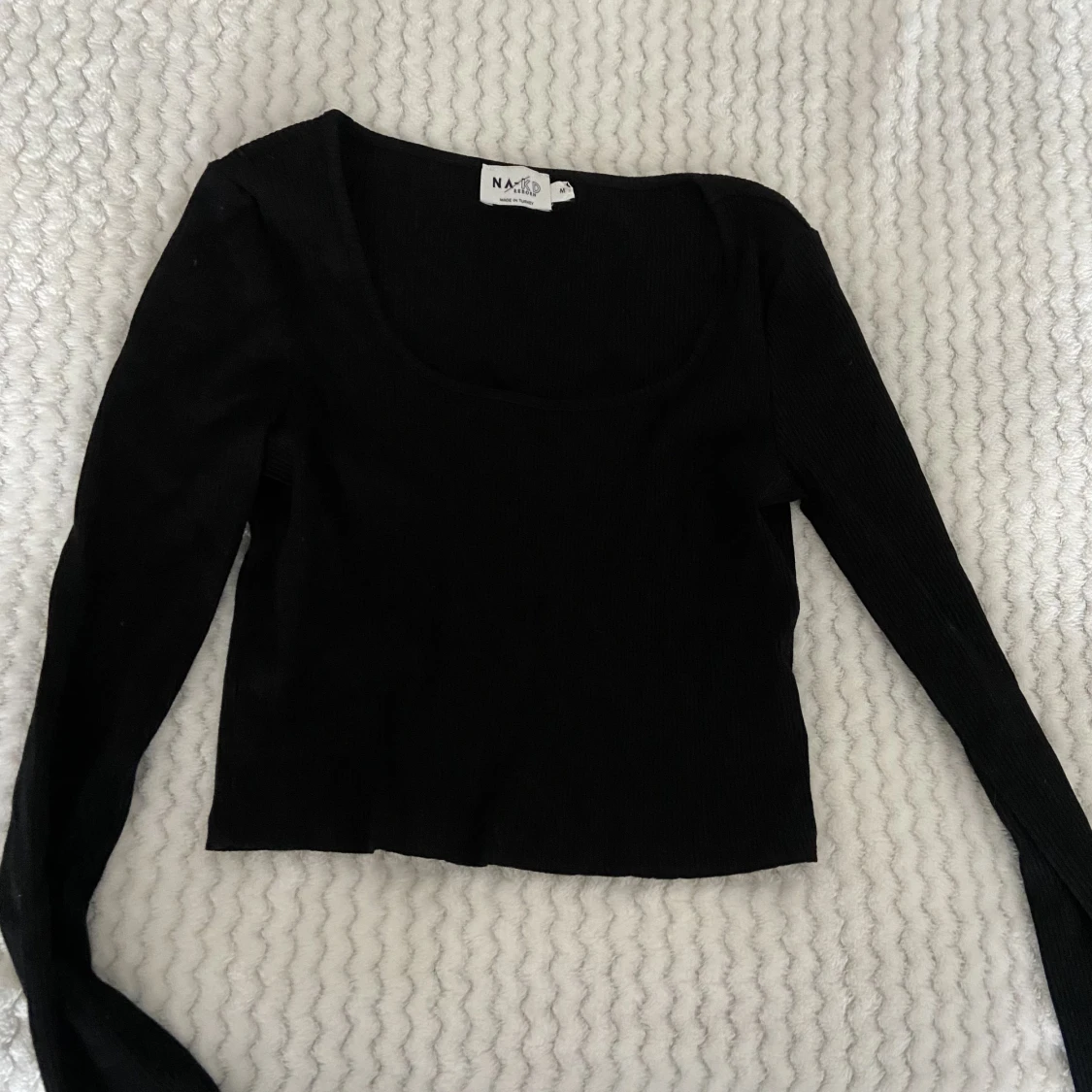 Långärmad ribbad tröja