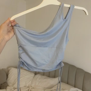 babyblå topp - ljusblå topp som aldrig är använd! 🩵