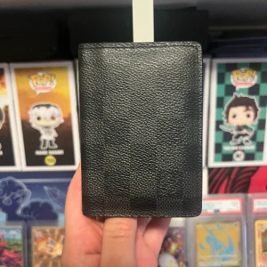 Louis Vuitton Damier Graphite pocket organiser - Plånbok i bra skick. Kommer med dustbag och kvitto
