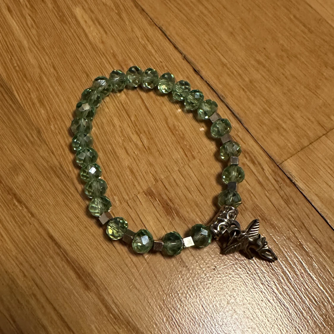 turkost amrband med silverängel