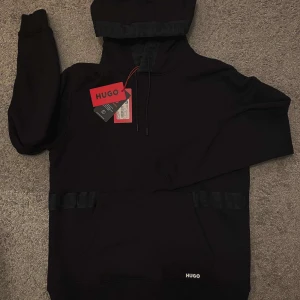 Hugo hoodie  - Helt ny Hugo tröja i storlek s men kan passa m.  