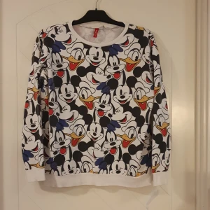 Tröja - Disney-tröja från H&M. Storlek S. 