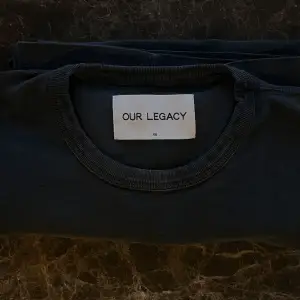 Our legacy t-shirt i storlek 46. Tvättad svart färg. 