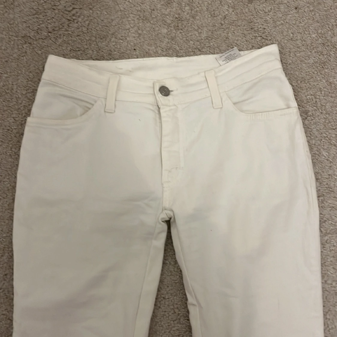 vita lågmidjade jeans