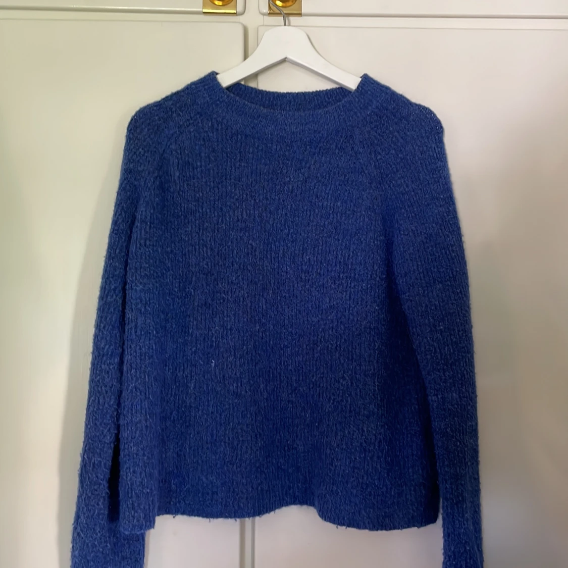 Blå tröja