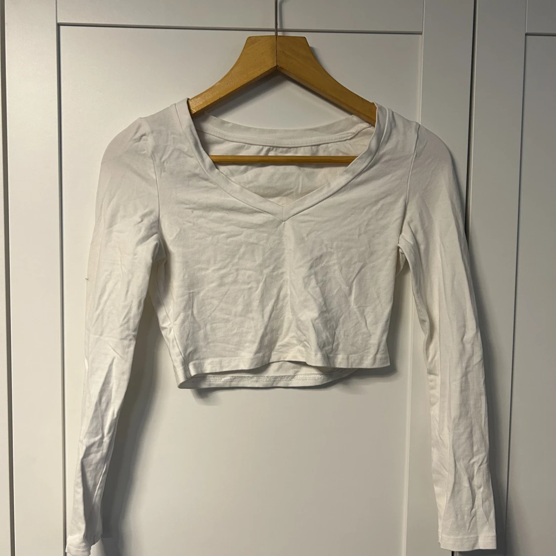 Vit långärmad croptopp