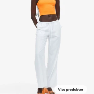 Lågmidjade linnebyxor - Slutsålda lågmidjade vita linnebyxor från h&m i strl XS. Helt oanvända med lappen kvar. 