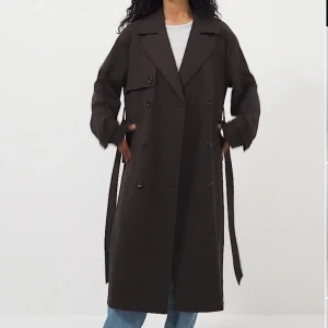 Kappa NAKD - En trenchcoat/kappa från NAKD, aldrig använd men försent att skicka tillbaks. Nyskick! 