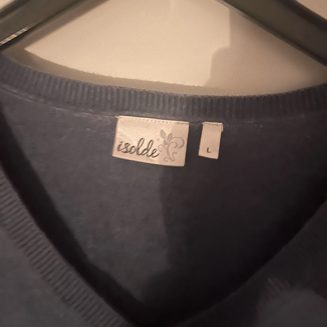 blå stickad tröja. M/L - 90