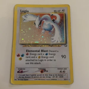 Lugia 1st edition  - En holographic lugia  1st edition fint skick för sin ålder , Lite skavanker i kanter.  Öppen för bud men inga lowballs 