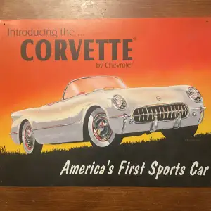 Metall affisch av Corvette första bil.