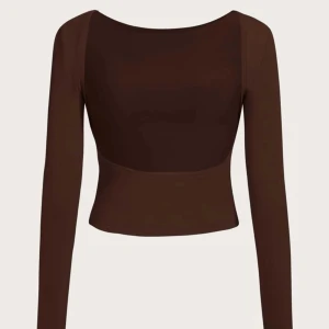 Rygglös topp  - Fin rygglös topp i storlek S. Aldrig använd!