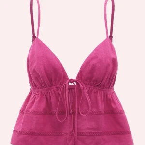 Skitsnygg rosa topp  - Skiitsnygg ”skrikrosa” topp med knyte därfram och öppen rygg. Passar perfekt till sommaren<33