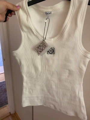 Linne - Linne loewe  Storlek L dock mycket liten i storlek 