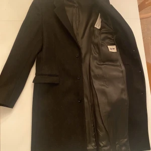 Acne ullrock strl 48 - Fin ullrock från Acne i nyskick. Endast använd ett par gånger.
