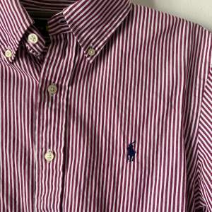 Ralph Lauren burgundy and whit striped shirt with a navy embroidered logo  Size S 💜