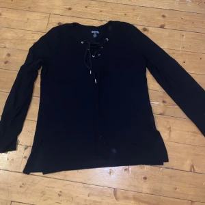 Michael kors - Svart michael kors lång ärmad tröja med silver accessories 