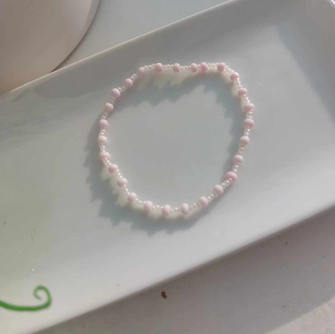 Ett rosa egengjort armband🩷 - 90