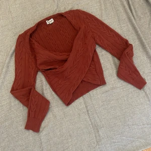 Karisma Crossover Knit Top - Crimson - Originally from Singapore - size is M. can check the image for size guide. Wore only once.   https://www.hervelvetvase.com/product/karisma-crossover-knit-top-crimson
