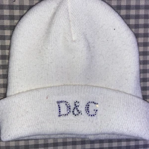 D & G mössa - Ej äkta Perfekt skick Onesize men passar ej mig som har afro (därför inga bilder med den på)